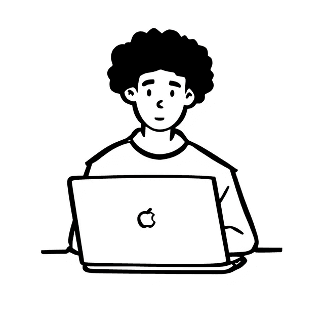 working behind a laptop