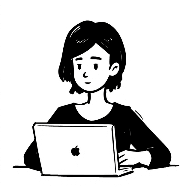 working behind a laptop